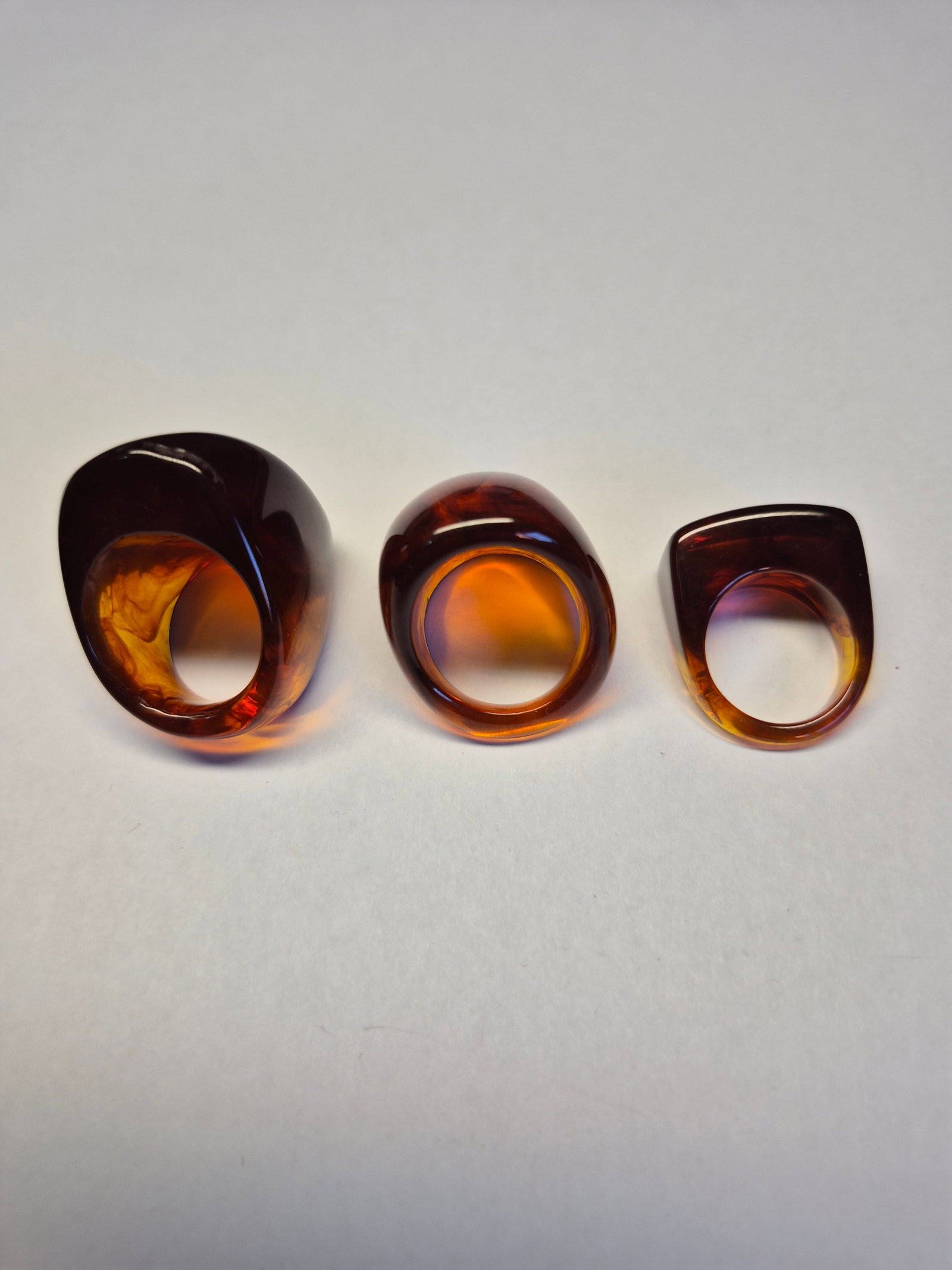 Vintage Amber-Style Resin Ring Set – 3 Statement Rings, Size 16: Title: Vintage Amber-Style Resin Ring Set – 3 Statement Rings, Size 16 Description: Set of three vintage-style statement rings in warm cognac and honey amber tones. Crafted from