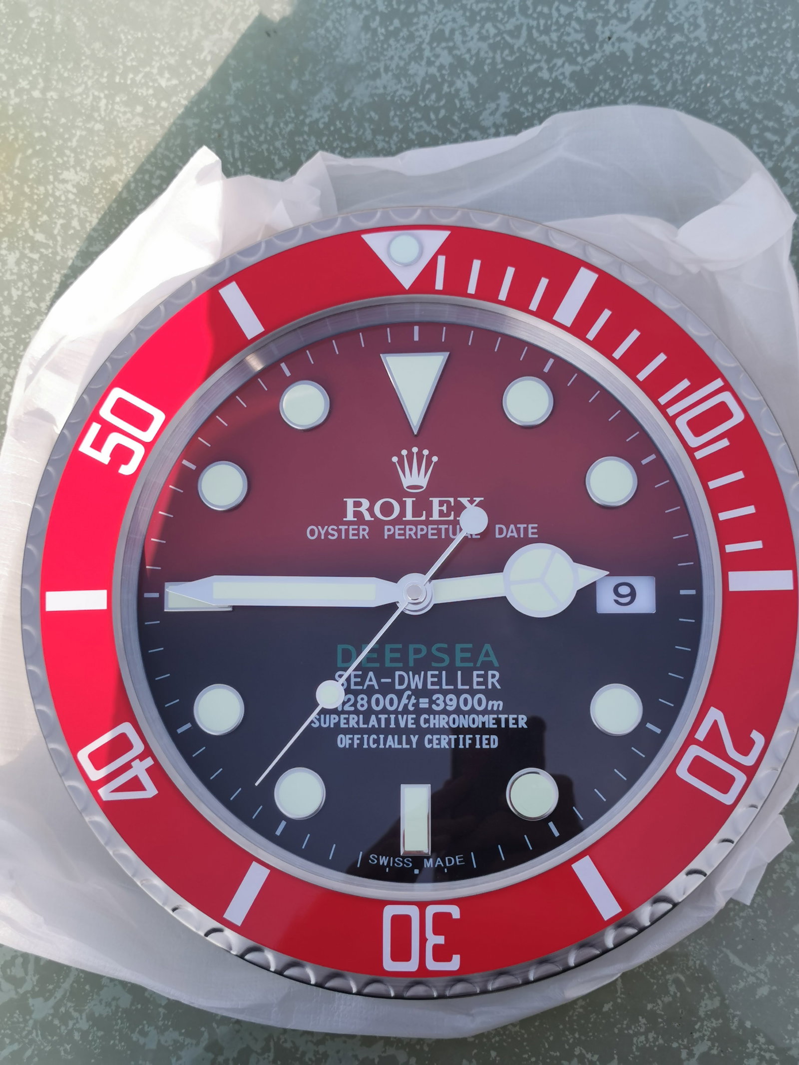 Rolex Deepsea Sea-Dweller Dealer Display Wall Clock – Red Bezel: Title: Rolex Deepsea Sea-Dweller Dealer Display Wall Clock – Red Bezel Description: Rolex Deepsea Sea-Dweller dealer display wall clock in brand new, unused condition. A must-have for any