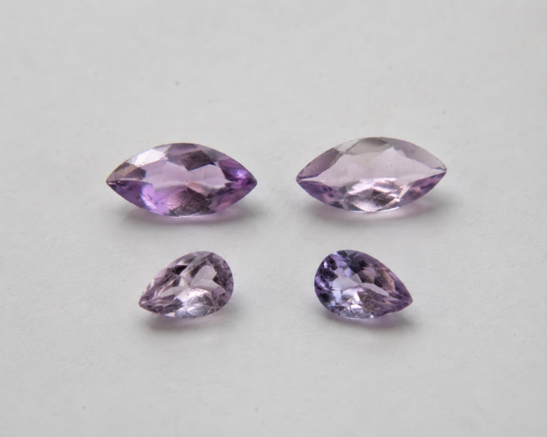 Natural Amethyst Gemstone Set 4.53 Ct – Marquise & Pear Cut Matching Stones: Title: Natural Amethyst Gemstone Set 4.53 Ct – Marquise & Pear Cut Matching Stones Description: Beautiful set of natural amethyst gemstones featuring two marquise-cut stones and two