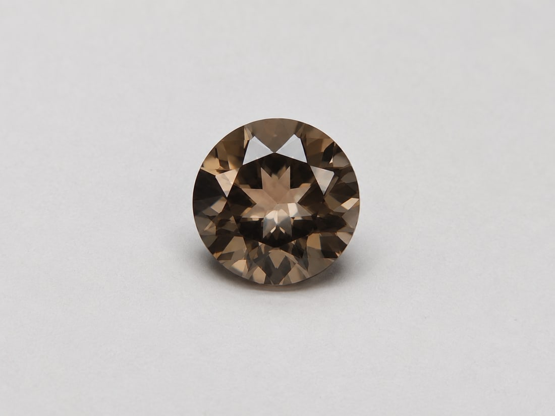 Natural Smoky Quartz Round 7mm Faceted Gemstone – Loose Stone: Title: Natural Smoky Quartz Round 7mm Faceted Gemstone – Loose Stone Description: Beautiful natural Smoky Quartz gemstone in a classic round cut, measuring 7mm. This stone displays warm