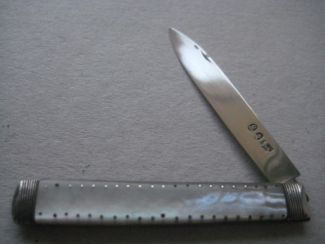 George III Mother of Pearl Hafted Silver Bladed Folding Fruit Knife: Title: George III Mother of Pearl Hafted Silver Bladed Folding Fruit Knife Description: George III Mother of Pearl Hafted Silver Bladed Folding Fruit Knife. The handle is decorated w