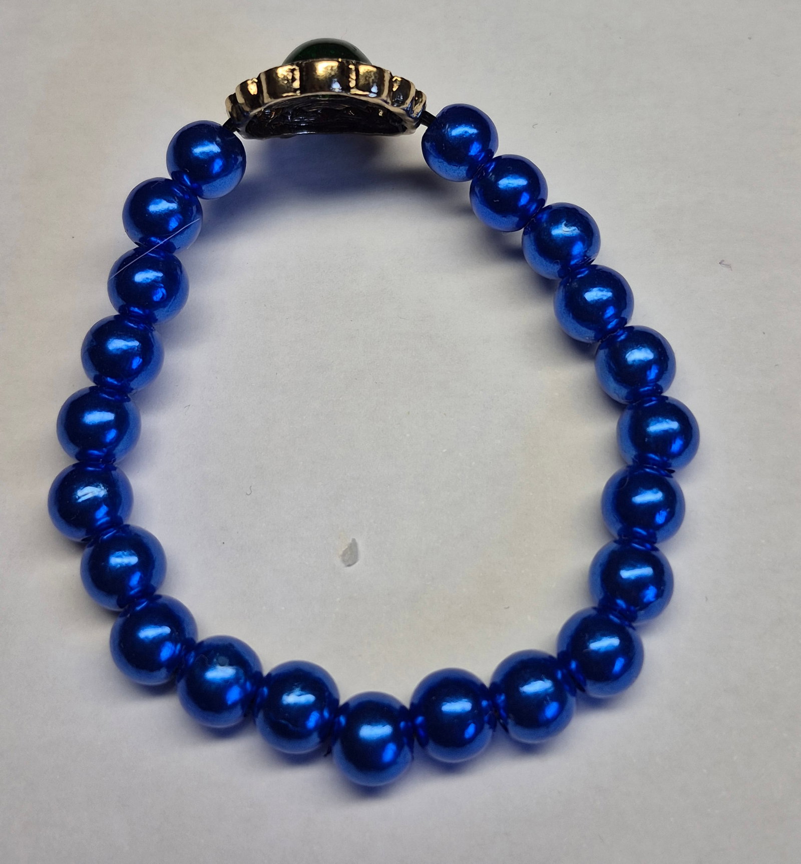 Royal Blue Elastic Bead Bracelet With Green Cabochon Centrepiece - 2