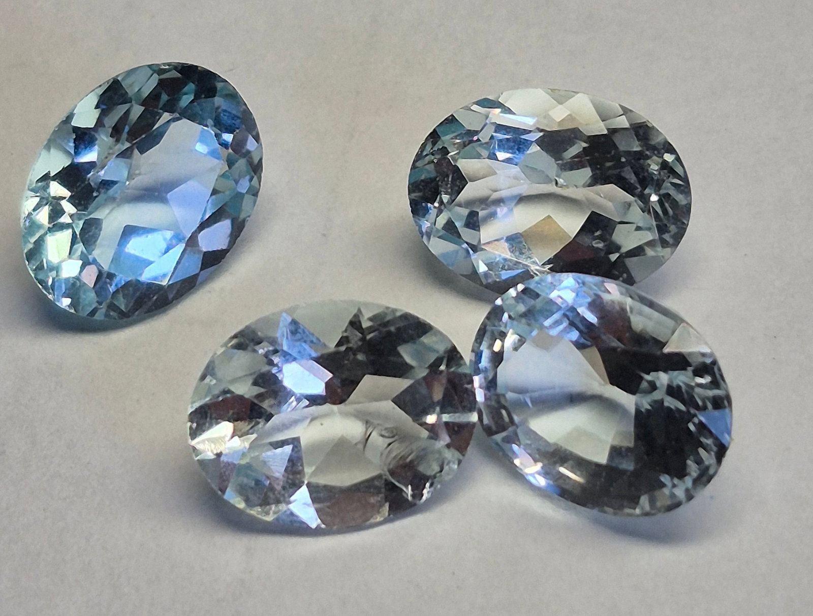Natural Sky Blue Topaz Parcel 7.10 ct – 4 Matching Oval Cut Gemstones 9x7 mm (1 of 2)
