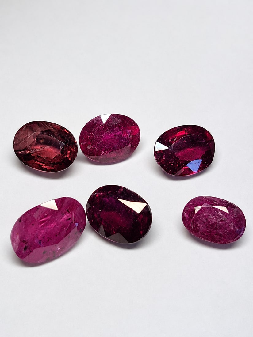 Natural Treated Ruby Oval Cut 10 Carat Loose Gemstone: Title: Natural Treated Ruby Oval Cut 10 Carat Loose Gemstone Description: Beautiful natural treated ruby in an elegant oval faceted cut, displaying rich red to deep raspberry tones with excellent b