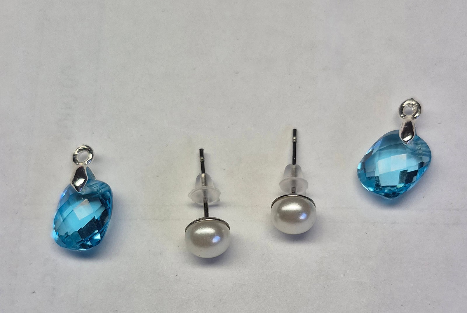 Convertible Pearl & Natural Blue Topaz Drop Earrings – Two Looks In One, Silver Plated: Title: Convertible Pearl & Natural Blue Topaz Drop Earrings – Two Looks In One, Silver Plated Description: Elegant convertible earrings featuring classic pearl stud tops and detachable