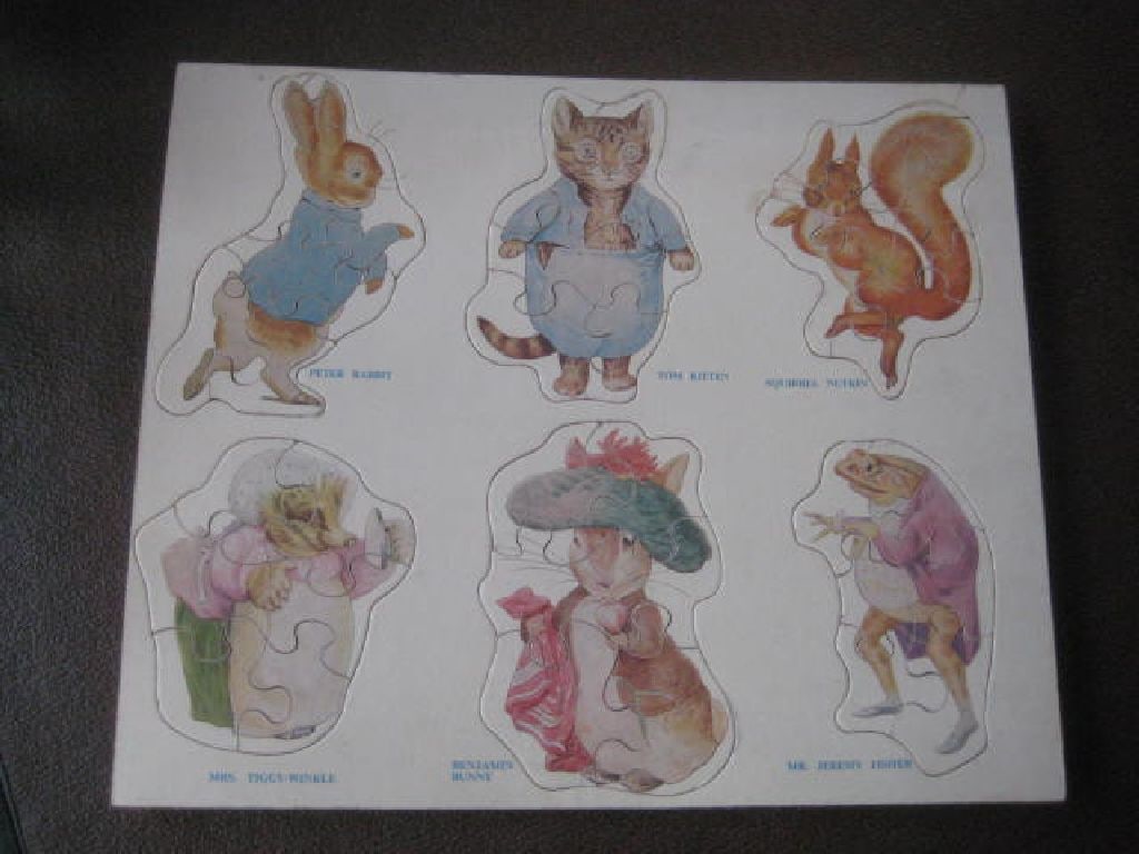 Vintage Peter Rabbit Children's Wooden Jigsaw: Title: Vintage Peter Rabbit Children's Wooden Jigsaw Description: Vintage Peter Rabbit Children's Wooden Jigsaw. Length is 12 Inches. Condition: Good. Condition: Used Delivery option: Delivery