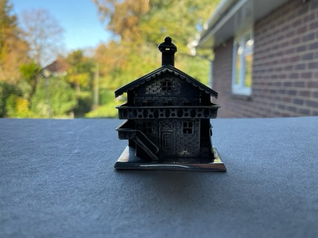 Rare Antique Dutch Silver Ski Chalet Miniature: Title: Rare Antique Dutch Silver Ski Chalet Miniature Description: Rare Antique Dutch Silver Miniature of a Ski Chalet. The lid is hinged and opens up to show a small storage compartment