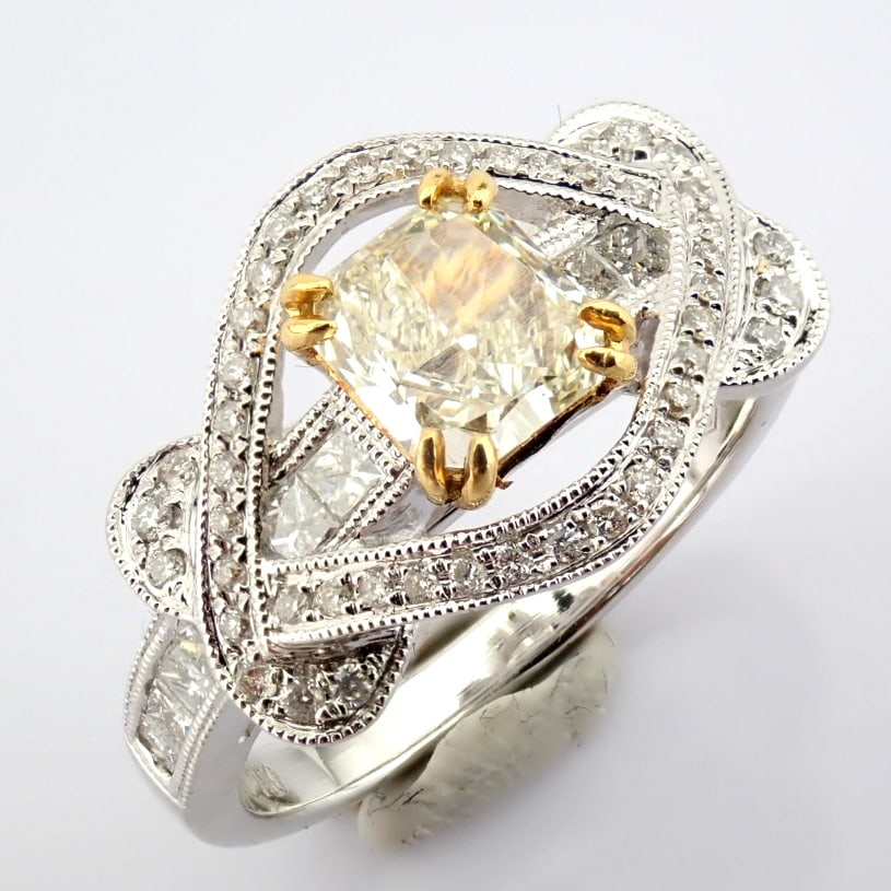 Natural Diamond 18K White Gold Ring: Title: Natural Diamond 18K White Gold Ring Description: An exquisite 18k ring with one big fancy diamond detailed brilliant diamonds total 1.55 ct -----------------------------------------------