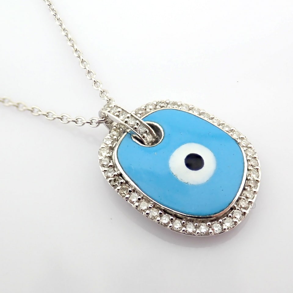 Natural Diamond 18K White Gold Necklace: Title: Natural Diamond 18K White Gold Necklace Description: 18K evil eye necklace detailed with enamel and brilliant diamonds -------------------------------------------------- • METAL