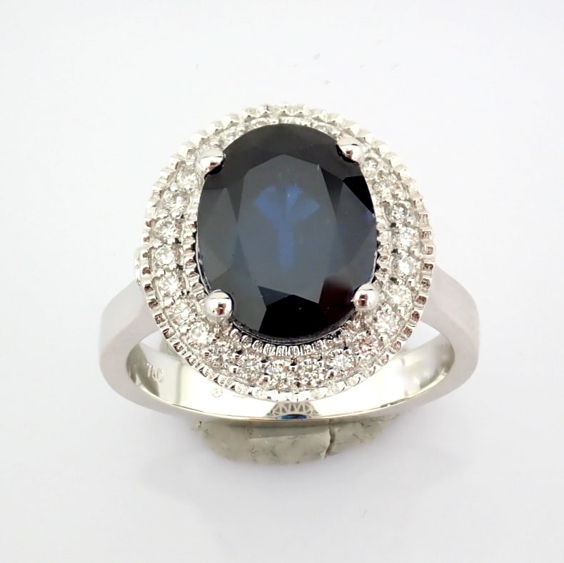 Natural Diamond 18K White Gold Ring: Title: Natural Diamond 18K White Gold Ring Description: An exquisite 18k white gold cluster ring detailed with sapphire and brilliant diamonds --------------------------------------------------