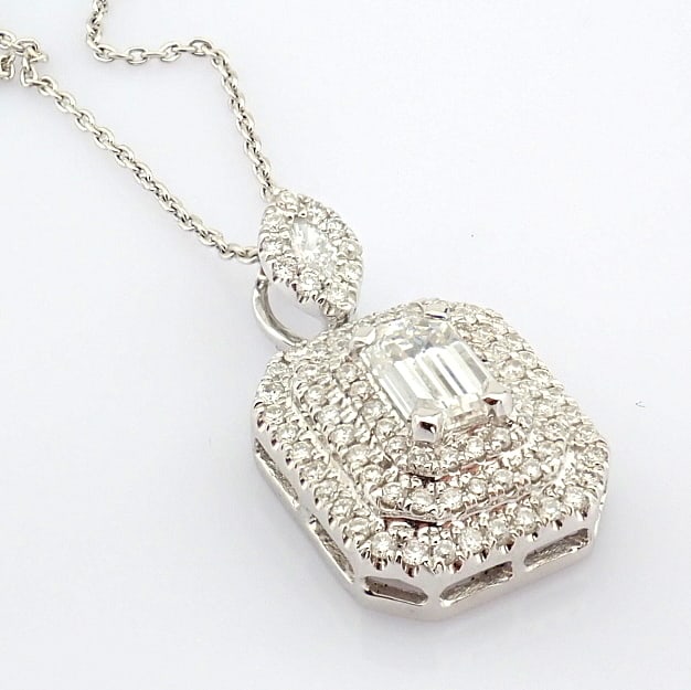 Natural Diamond 18K White Gold Necklace: Title: Natural Diamond 18K White Gold Necklace Description: An exquisite 18k white gold necklace detailed with baguette and brilliant diamonds --------------------------------------------------
