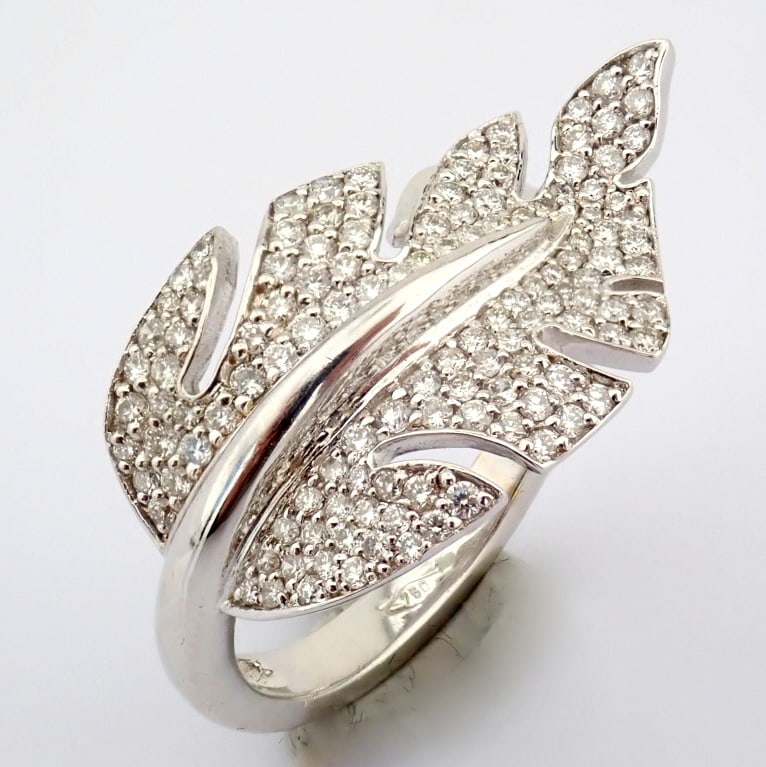 Natural Diamond 18K White Gold Ring: Title: Natural Diamond 18K White Gold Ring Description: An exquisite leaf ring intricately detailed with brilliant diamonds and 18k gold -------------------------------------------------- &#