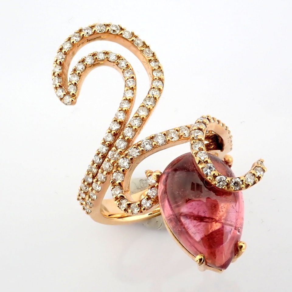 Natural Diamond 18K Rose/Pink Gold Ring: Title: Natural Diamond 18K Rose/Pink Gold Ring Description: An exquisite 18k ring detailed with 8ct 'cab 'tourmaline and 1.23 ct diamonds. -------------------------------------------------- •