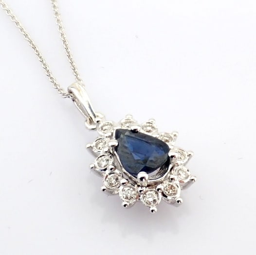 Natural Diamond 18K White Gold Necklace: Title: Natural Diamond 18K White Gold Necklace Description: 18K white gold cluster necklace detailed with sapphire and brilliant diamonds -------------------------------------------------- &