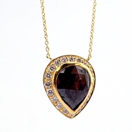 Natural Diamond 18K Yellow Gold Necklace: Title: Natural Diamond 18K Yellow Gold Necklace Description: 18K yellow gold cluster necklace detailed with fancy cut rough diamond in the centre and brilliant diamonds on frame.