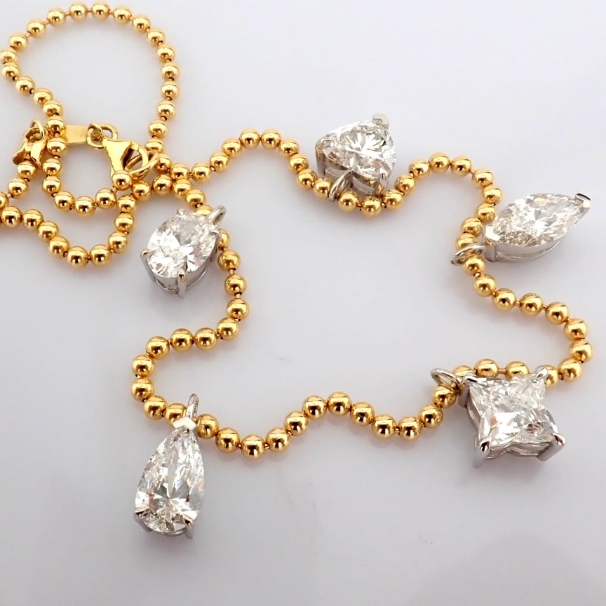 Marquise Cut Lab-Grown Diamond Necklace - 8.46 Total Carat (IGI Certified): Title: Marquise Cut Lab-Grown Diamond Necklace - 8.46 Total Carat (IGI Certified) Description: -------------------------------------------------- METALS AND WEIGHTS : -14K Yellow /White Gold 13.26 gr