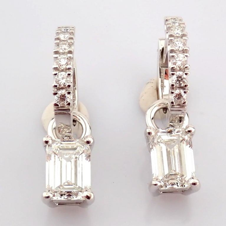 Emerald Cut Lab-Grown Diamond Earring - 2.41 Total Carat (IGI Certified): Title: Emerald Cut Lab-Grown Diamond Earring - 2.41 Total Carat (IGI Certified) Description: -------------------------------------------------- METALS AND WEIGHTS : -14K White Gold 4 gr