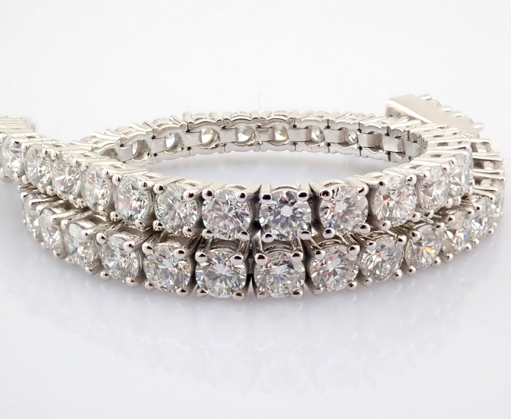 Round Cut Lab-Grown Diamond Tennis Bracelet - 7.27 Total Carat (MDI Certified): Title: Round Cut Lab-Grown Diamond Tennis Bracelet - 7.27 Total Carat (MDI Certified) Description: -------------------------------------------------- METALS AND WEIGHTS : -14K White Go