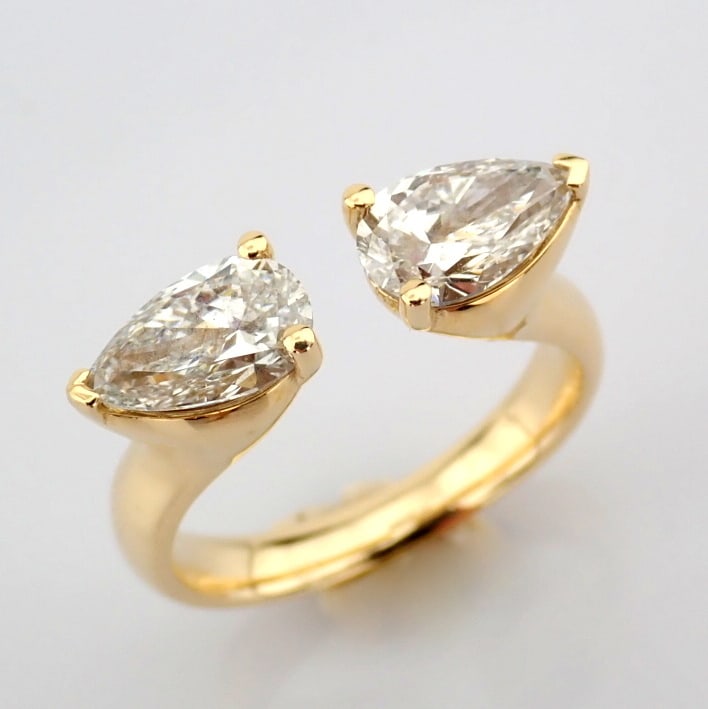 Pear Cut Lab-Grown Diamond Ring - 1.97 Total Carat (IGI Certified): Title: Pear Cut Lab-Grown Diamond Ring - 1.97 Total Carat (IGI Certified) Description: -------------------------------------------------- METALS AND WEIGHTS : -14K Yellow Gold 4.84 gr