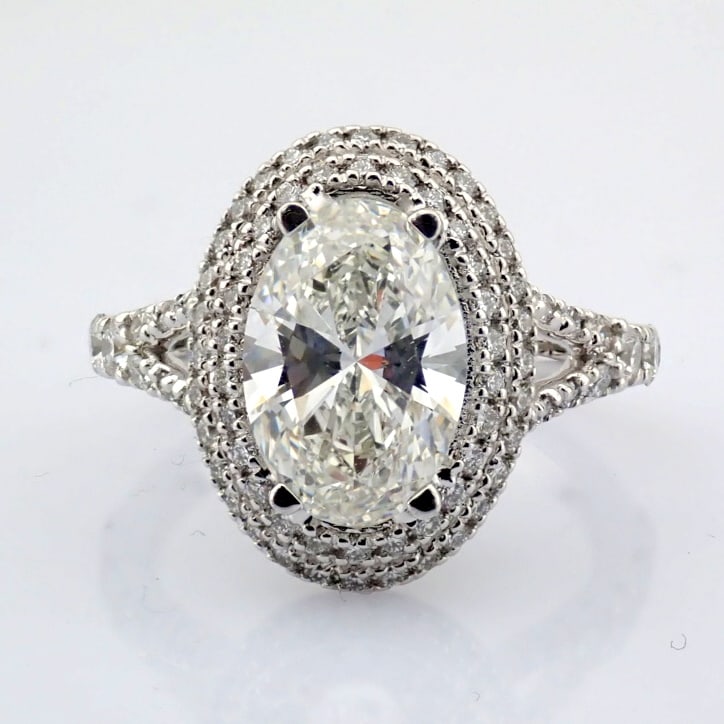 Oval Cut Lab-Grown Diamond Ring - 2.65 Total Carat (IGI Certified): Title: Oval Cut Lab-Grown Diamond Ring - 2.65 Total Carat (IGI Certified) Description: -------------------------------------------------- METALS AND WEIGHTS : -18K WHITE GOLD 4.71 gr