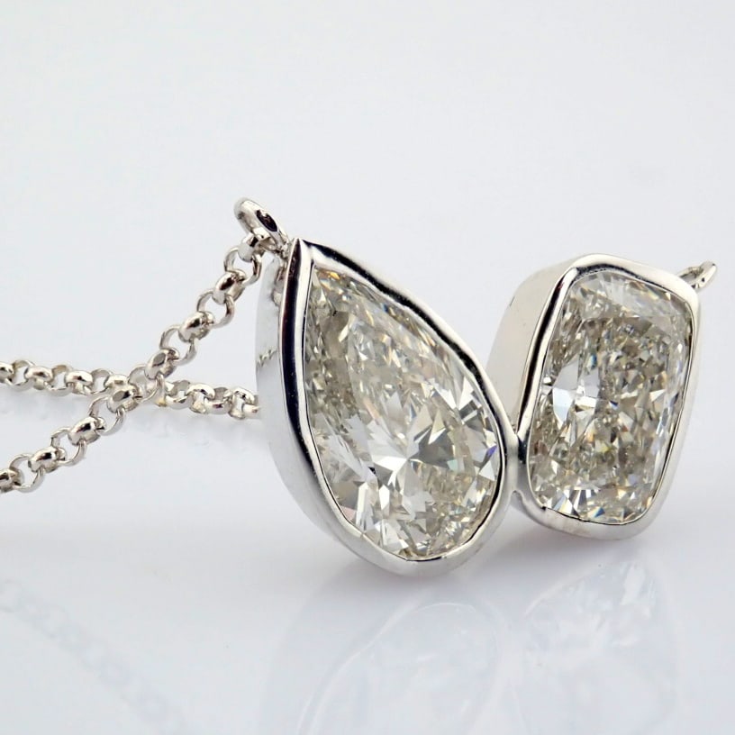 Cushion Cut Lab-Grown Diamond Necklace - 2.56 Total Carat (IGI Certified): Title: Cushion Cut Lab-Grown Diamond Necklace - 2.56 Total Carat (IGI Certified) Description: -------------------------------------------------- METALS AND WEIGHTS : -14K White Gold 3.96 gr