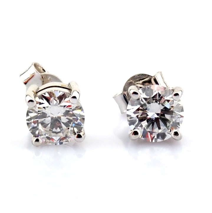 Round Cut Lab-Grown Diamond Earring - 1.5 Total Carat (MDI Certified): Title: Round Cut Lab-Grown Diamond Earring - 1.5 Total Carat (MDI Certified) Description: -------------------------------------------------- METALS AND WEIGHTS : -14K White Gold 1.65 g