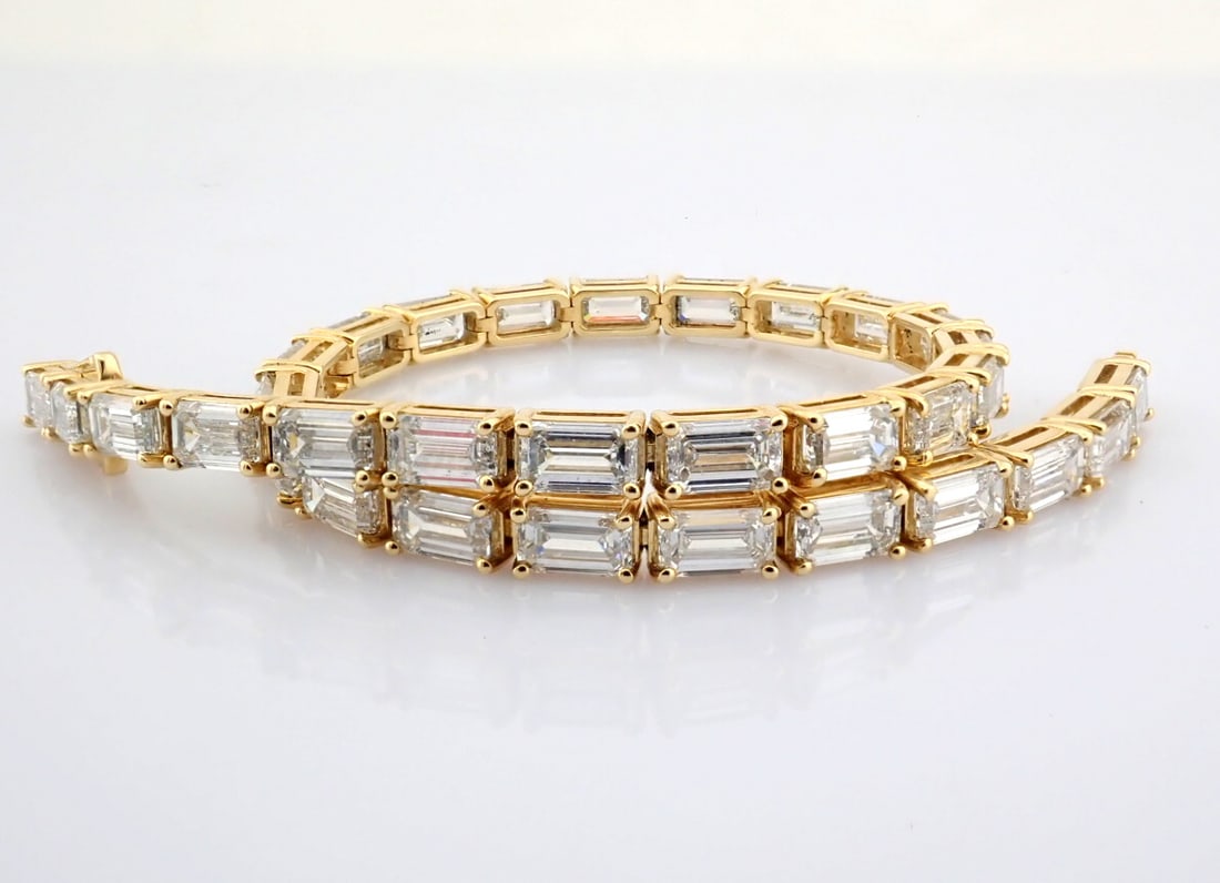 Emerald Cut Lab-Grown Diamond Tennis Bracelet - 10.16 Total Carat (MDI Certified): Title: Emerald Cut Lab-Grown Diamond Tennis Bracelet - 10.16 Total Carat (MDI Certified) Description: -------------------------------------------------- METALS AND WEIGHTS : -14K Yello