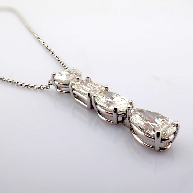 Emerald Cut Lab-Grown Diamond Necklace - 4.4 Total Carat (IGI Certified): Title: Emerald Cut Lab-Grown Diamond Necklace - 4.4 Total Carat (IGI Certified) Description: -------------------------------------------------- METALS AND WEIGHTS : -14K White Gold 4.86 gr