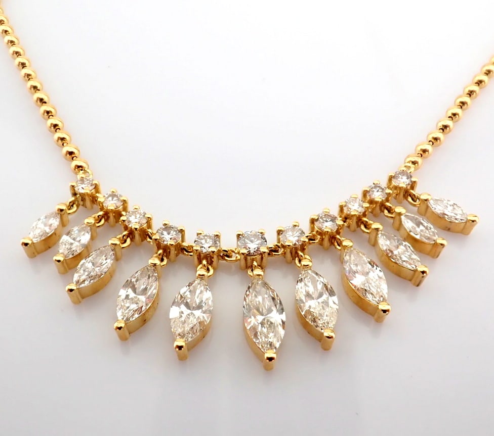 Marquise Cut Lab-Grown Diamond Necklace - 6.33 Total Carat (MDI Certified): Title: Marquise Cut Lab-Grown Diamond Necklace - 6.33 Total Carat (MDI Certified) Description: -------------------------------------------------- METALS AND WEIGHTS : -14K Yellow Gold 17.51 gr