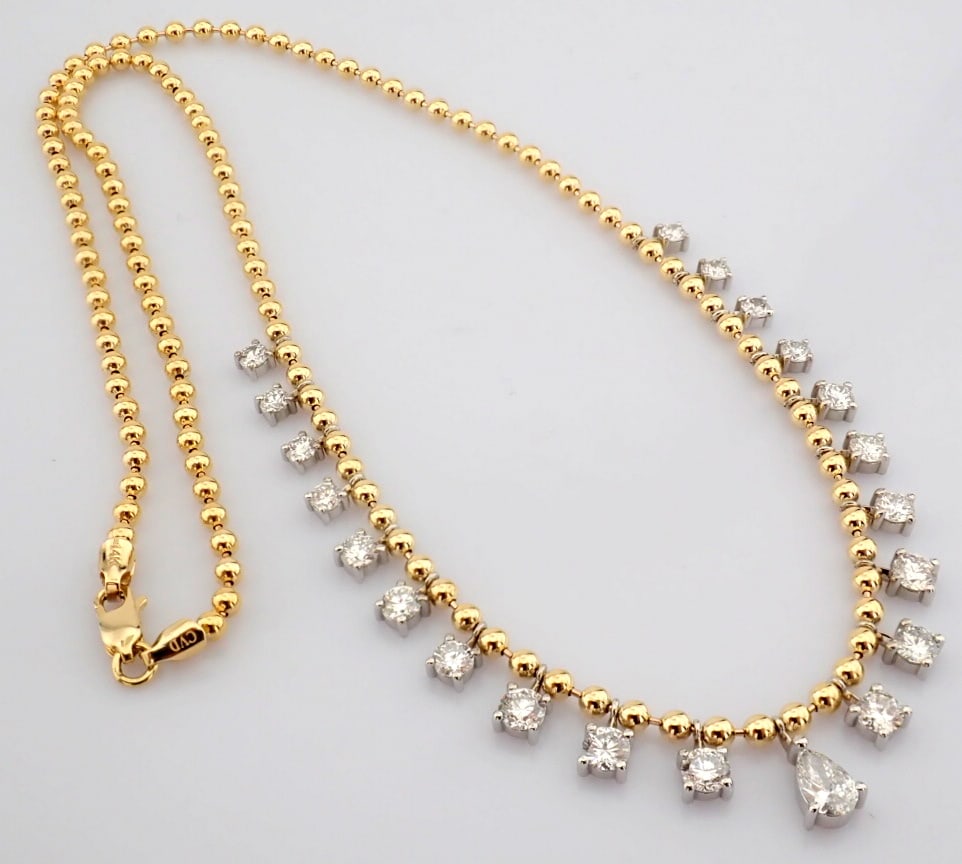 Pear Cut Lab-Grown Diamond Necklace - 2.77 Total Carat (MDI Certified): Title: Pear Cut Lab-Grown Diamond Necklace - 2.77 Total Carat (MDI Certified) Description: -------------------------------------------------- METALS AND WEIGHTS : -14K Yellow/White Gold 13.64 gr