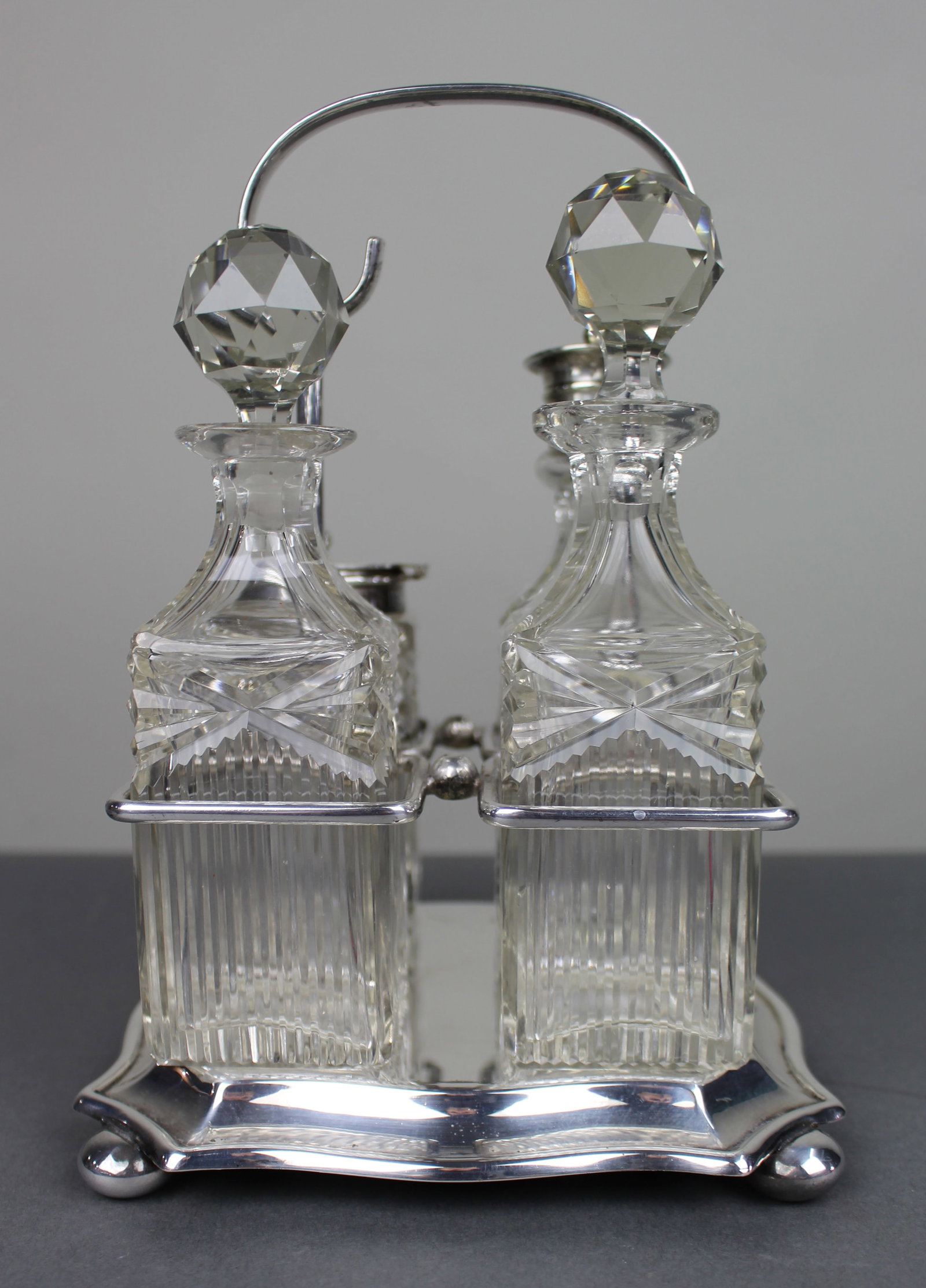 Antique Silver Plated & Cut Glass Cruet Set: Title: Antique Silver Plated & Cut Glass Cruet Set Description: Antique Silver Plated & Cut Glass Cruet Set Silver plate and cut glass. Stamped to the underside EPNS Made in England Ltd.