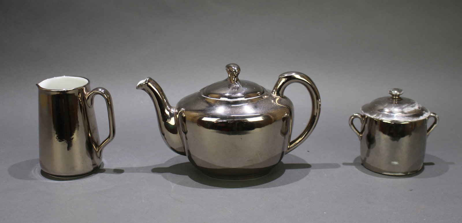 Royal Worcester Platinum Lustre: Title: Royal Worcester Platinum Lustre Description: Royal Worcester Platinum Lustre Teapot, Cream Jug & Sugar Pot All pieces stamped to the underside. No chips, cracks or repairs. Some wear to