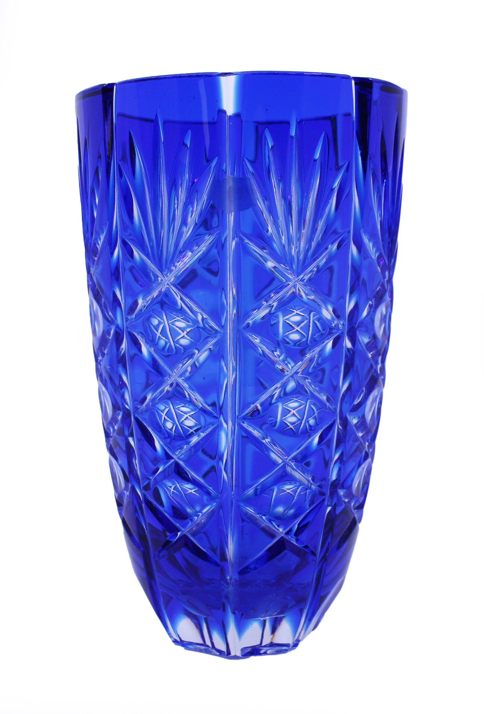 English Vintage Blue Overlay CrystalVase: Title: English Vintage Blue Overlay CrystalVase Description: English Vintage Blue Overlay Crystal Glass Vase – Stourbridge, Mid-20th Century A striking cut overlay crystal vase in r