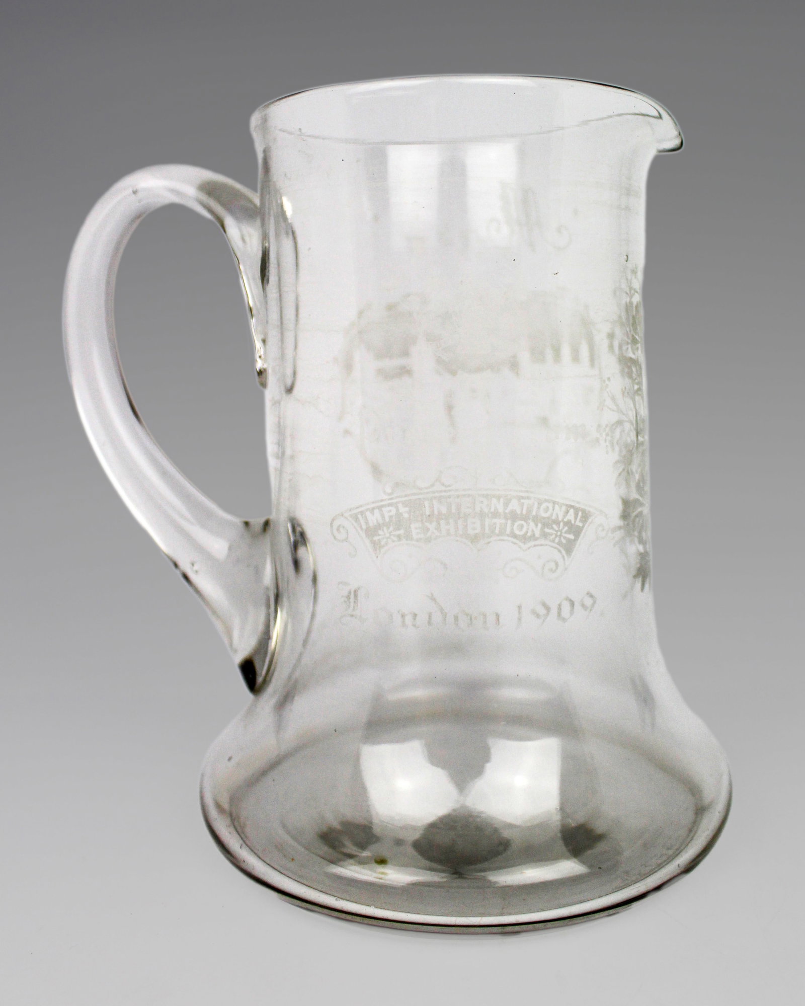 Edwardian Imperial International Exhibition London Glass Tankard: Title: Edwardian Imperial International Exhibition London Glass Tankard Description: Edwardian Commemorative Glass Tankard – Imperial International Exhibition London 1909 A good original