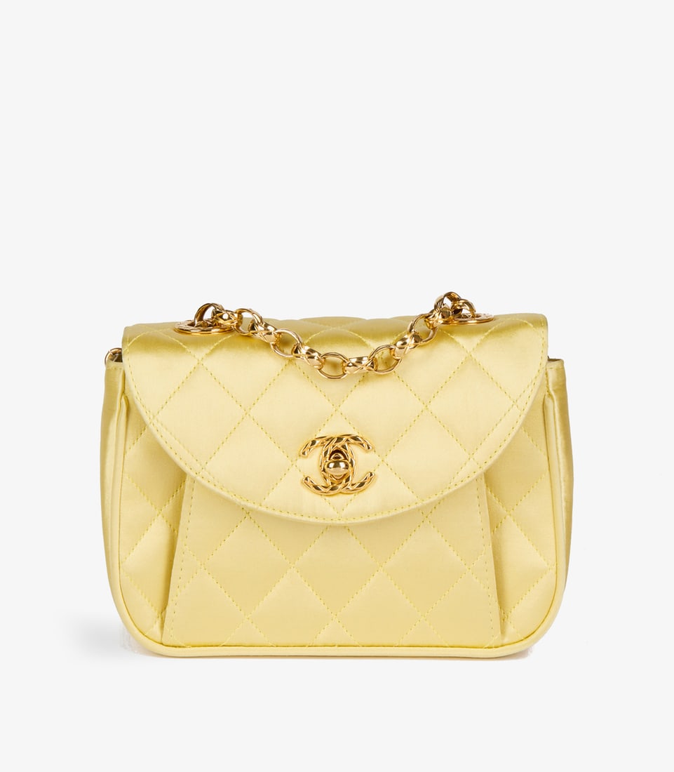 Chanel Yellow Quilted Satin Vintage Mini Flap Bag: Title: Chanel Yellow Quilted Satin Vintage Mini Flap Bag Description: Chanel Yellow Quilted Satin Vintage Mini Flap Bag Product Details Ref: HB4857 Brand: Chanel Mod