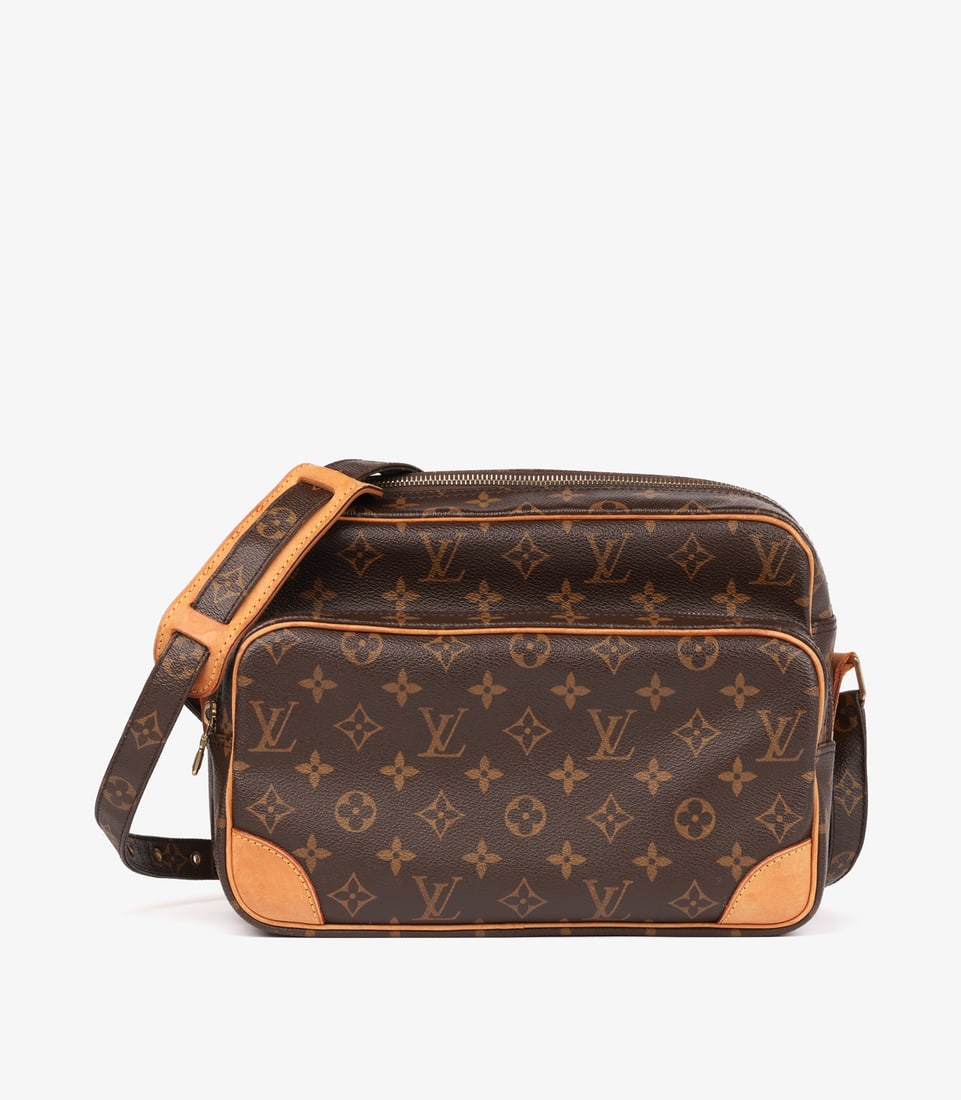 Brown Monogram Coated Canvas & Vachetta Leather Vintage Nile: Title: Brown Monogram Coated Canvas & Vachetta Leather Vintage Nile Description: Louis Vuitton Brown Monogram Coated Canvas & Vachetta Leather Vintage Nile Product Details Ref: HB5949