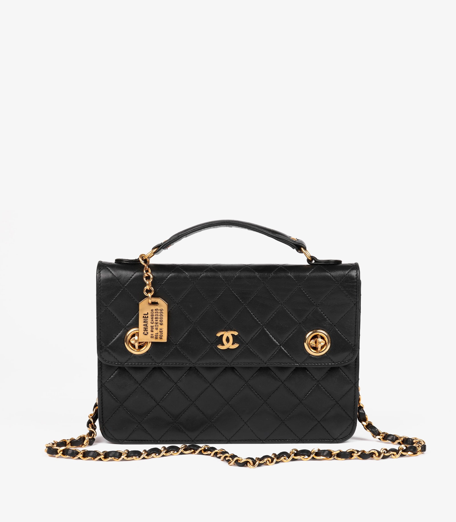 Chanel Black Quilted Lambskin Vintage Small Classic Single Flap Bag with Top Handle: Title: Chanel Black Quilted Lambskin Vintage Small Classic Single Flap Bag with Top Handle Description: Chanel Black Quilted Lambskin Vintage Small Classic Single Flap Bag with Top Handl
