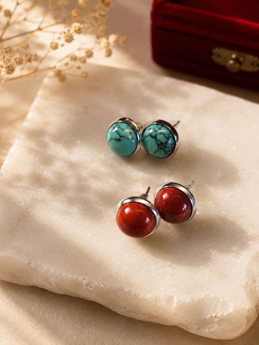 Stainless Steel Stud Earrings – Turquoise & Red Cabochon Set: Title: Stainless Steel Stud Earrings – Turquoise & Red Cabochon Set Description: Stylish stainless steel stud earrings featuring polished cabochon stones in vibrant turquoise and deep red