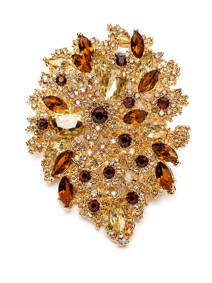 Vintage Amber & Champagne Crystal Statement Brooch – Gold Tone Floral Design: Title: Vintage Amber & Champagne Crystal Statement Brooch – Gold Tone Floral Design Description: Elegant vintage-style statement brooch featuring sparkling amber, champagne, and clear