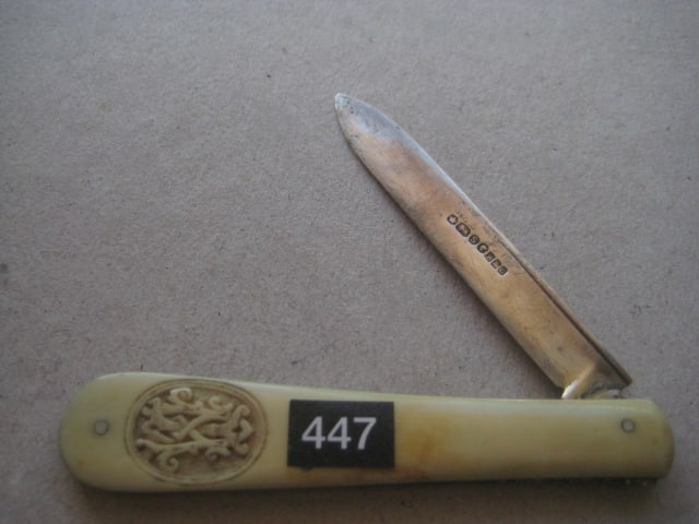 Victorian Bone Hafted Silver Bladed Folding Fruit Knife: Title: Victorian Bone Hafted Silver Bladed Folding Fruit Knife Description: Victorian Bone Hafted Silver Bladed Folding Fruit Knife. The handle is has the initials "IM" carved out