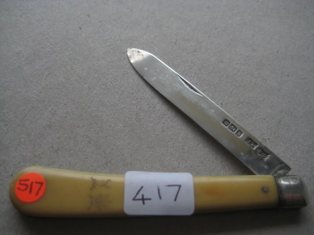 Rare Victorian Bone Hafted Silver Bladed Folding Fruit Knife: Title: Rare Victorian Bone Hafted Silver Bladed Folding Fruit Knife Description: Victorian Bone Hafted Silver Bladed Folding Fruit Knife. The handle is etched with Two Crests on