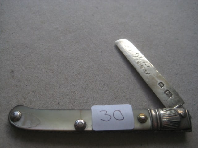 Rare George III Scimitar Silver Bladed Folding Fruit Knife: Title: Rare George III Scimitar Silver Bladed Folding Fruit Knife Description: Rare George III Mother of Pearl Hafted Scimitar Silver Bladed Folding Fruit Knife. The hand
