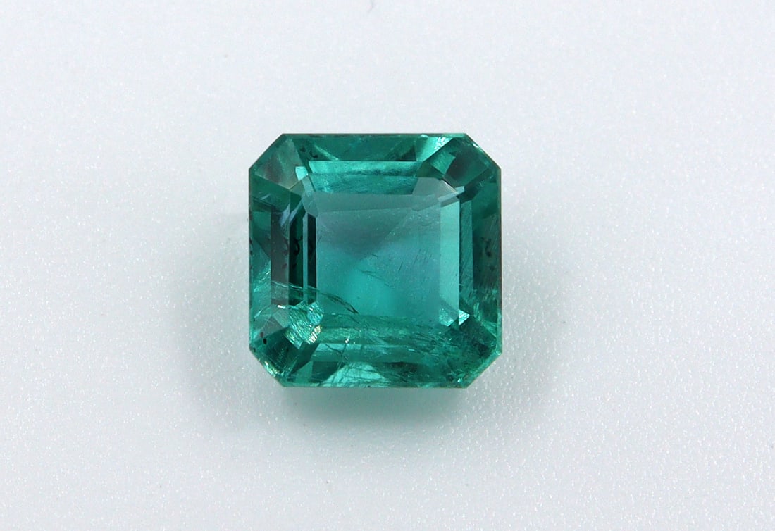 Emerald 1.63 CT: Title: Emerald 1.63 CT Description: Species: Beryl Variety: Emerald Shape: Square Emerald Cut Measurements: 7.16x7.07x4.78mm Colour: Green Certificate: Yes (IGI/Full
