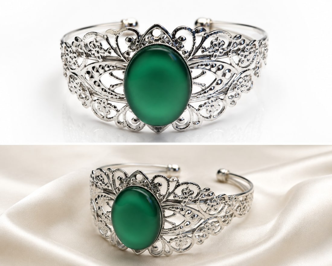 Green Cabochon Cuff Bracelet – Rhodium Plated Filigree Bracelet: Title: Green Cabochon Cuff Bracelet – Rhodium Plated Filigree Bracelet Description: Elegant rhodium-plated cuff bracelet featuring a polished green cabochon centrepiece set within an intricat
