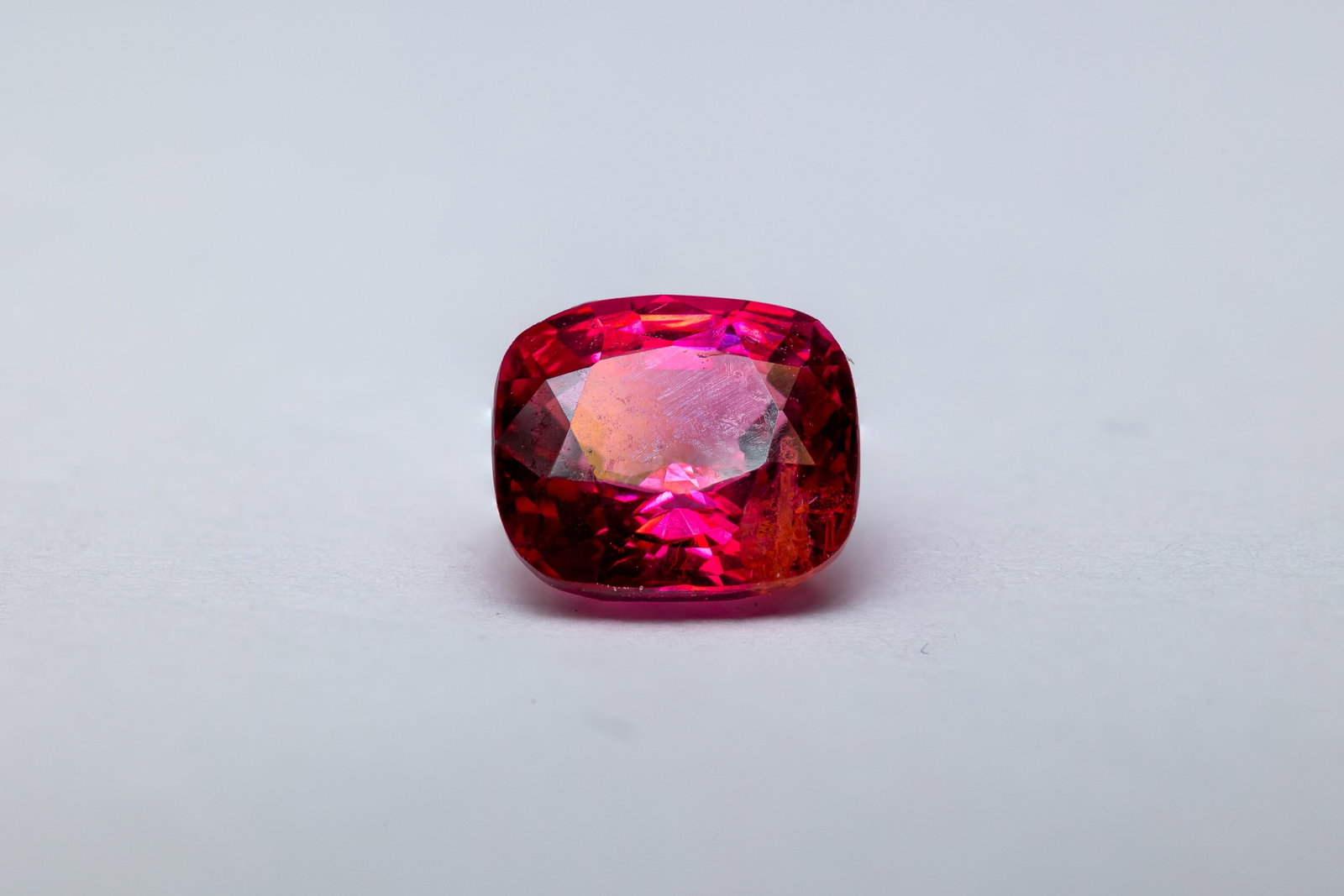 Spinel 1.08 Ct: Title: Spinel 1.08 Ct Description: Species: Natural Spinel Variety: Red Spinel Shape: Cushion Measurements: 5.80x6.11x3.71mm Colour: Pinkish Red Comment: Untreated 