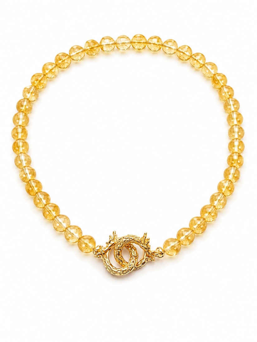 Natural Citrine Bead Necklace With Gold Tone Designer Clasp: Title: Natural Citrine Bead Necklace With Gold Tone Designer Clasp Description: Elegant necklace featuring polished natural citrine gemstone beads in warm golden-yellow tones. Finished wi