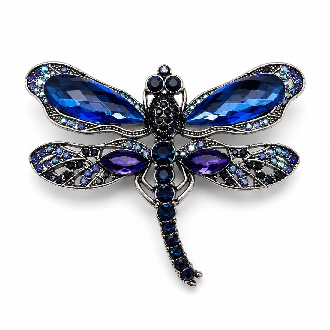 Vintage Blue Crystal Dragonfly Brooch – Silver Tone Statement Pin: Title: Vintage Blue Crystal Dragonfly Brooch – Silver Tone Statement Pin Description: Elegant vintage-style dragonfly brooch featuring brilliant blue and violet crystals with sparkling