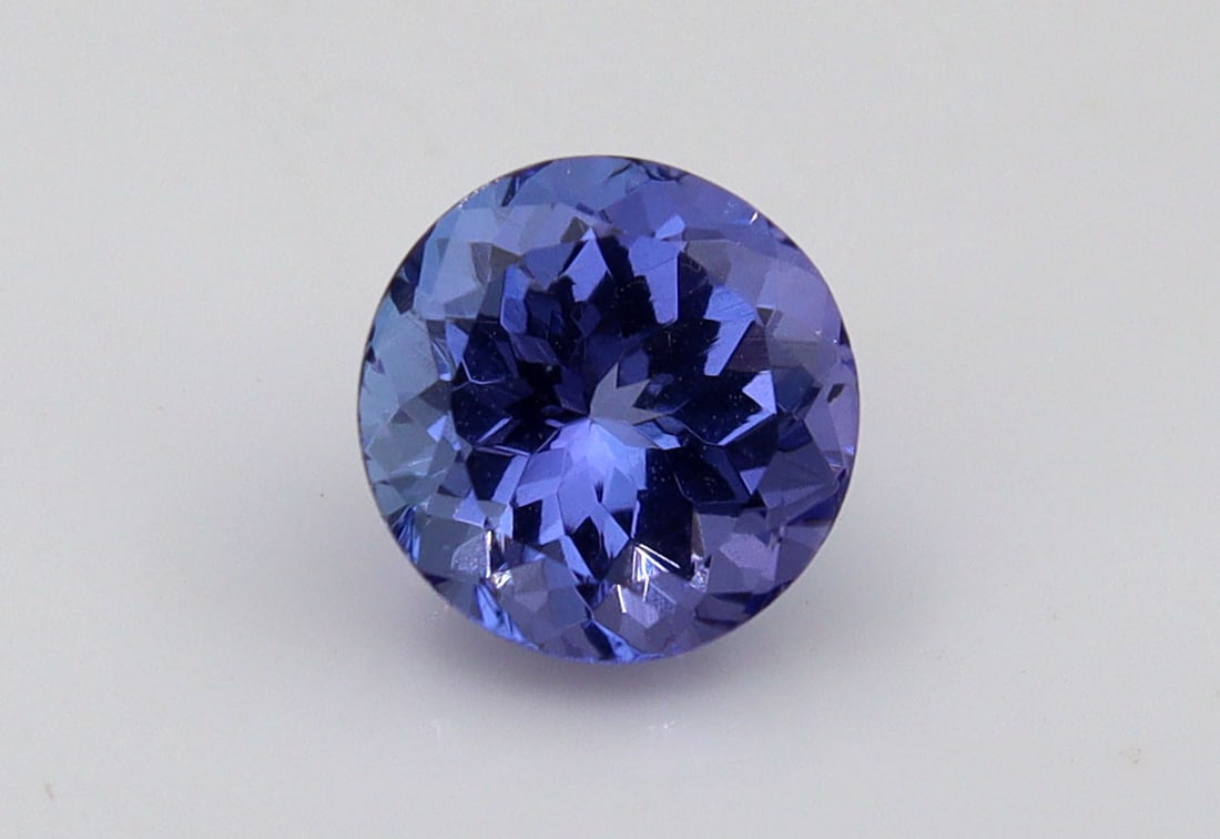 Tanzanite, 1.56 Ct: Title: Tanzanite, 1.56 Ct Description: Species: Zoisite Variety: Tanzanite Shape: Round Measurements: 6.99-7.11x4.80mm Colour: Bluish Violet Certificate: Yes (IGI/
