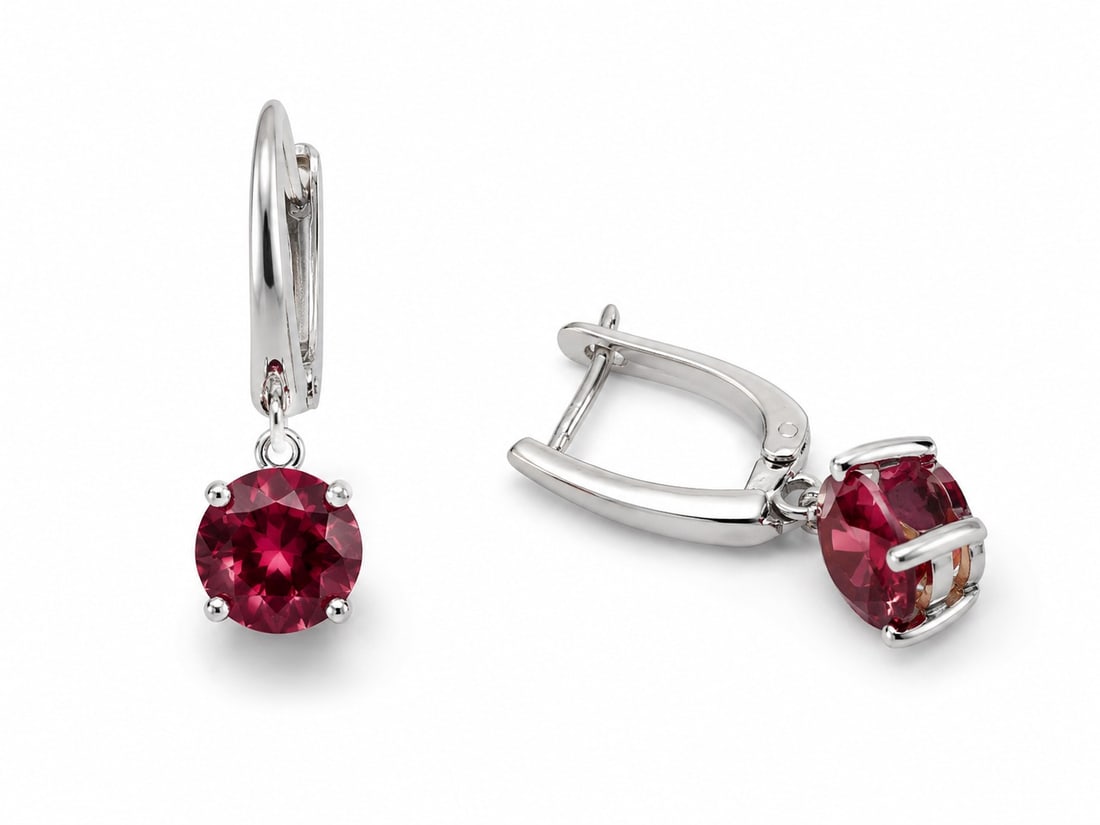 Silver-Plated Ruby Red Corundum Earrings – 8 mm Round Cut: Title: Silver-Plated Ruby Red Corundum Earrings – 8 mm Round Cut Description: Elegant silver-plated drop earrings featuring brilliant 8 mm round-cut ruby red corundum gemstones. The