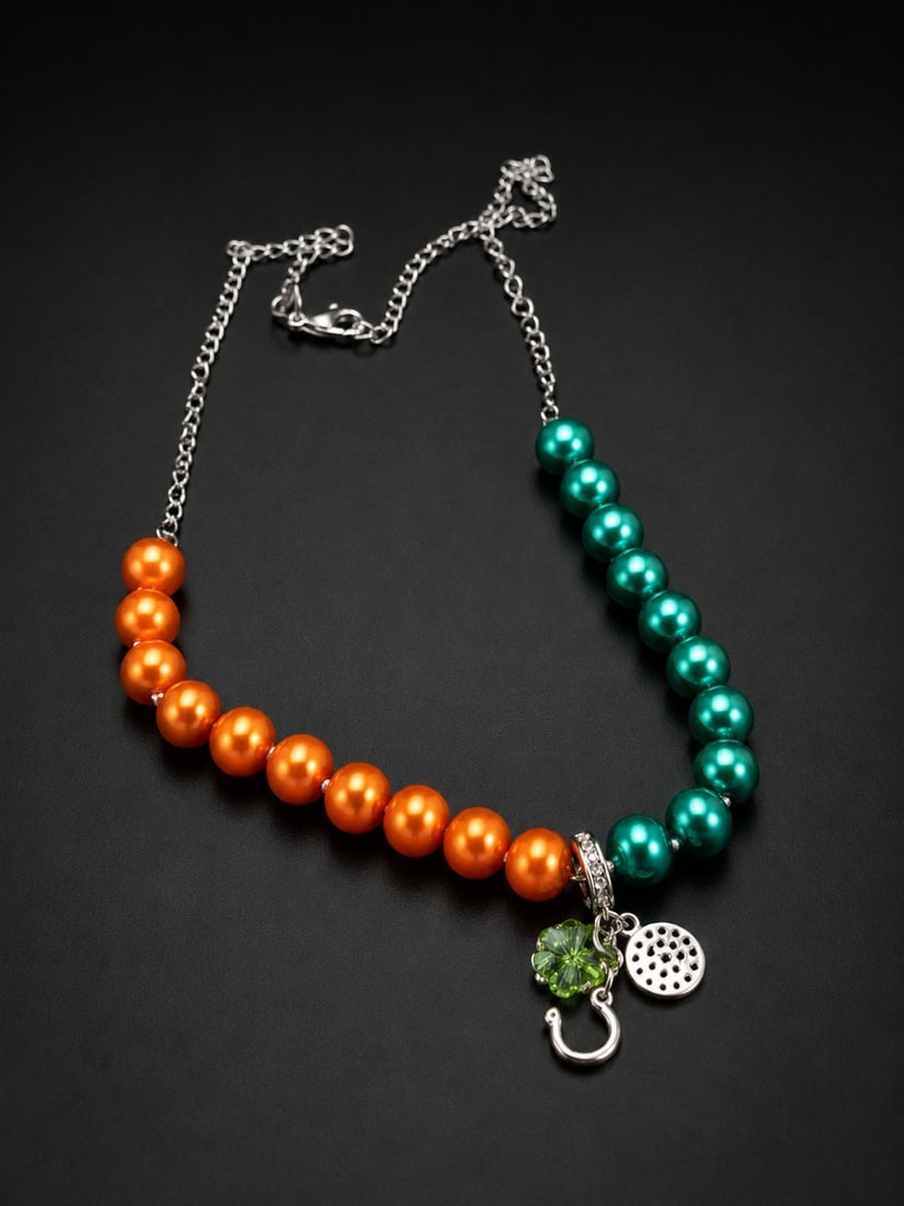 Two-Tone Faux Pearl Necklace with Stainless Steel Chain & Sterling Silver Clasp – 39 cm: Title: Two-Tone Faux Pearl Necklace with Stainless Steel Chain & Sterling Silver Clasp – 39 cm Description: Charming two-tone necklace featuring lustrous faux pearls in vibrant turquoise